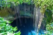 Swim in the Ik Kil Cenote: a refreshing stop
